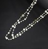 Korean Long Pearl Necklace: Trendy Multi-layer Hollow Flower Sweater Chain for Women