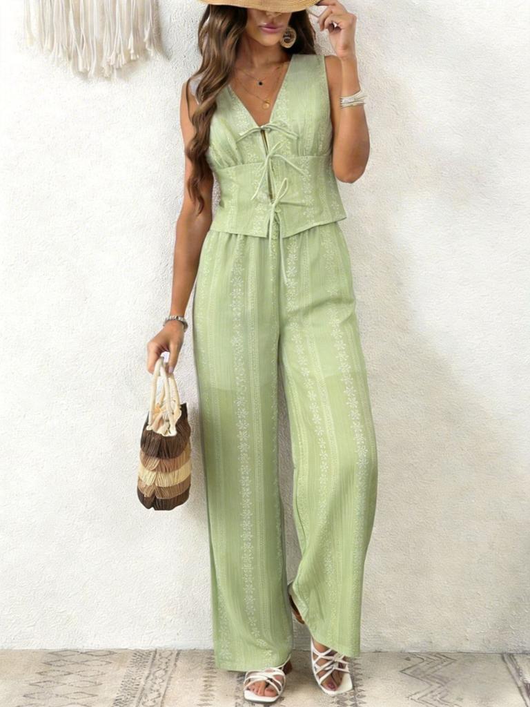Sleeveless V-Neck Romper Shorts with Floral Print and Tie Detail in Light Blue