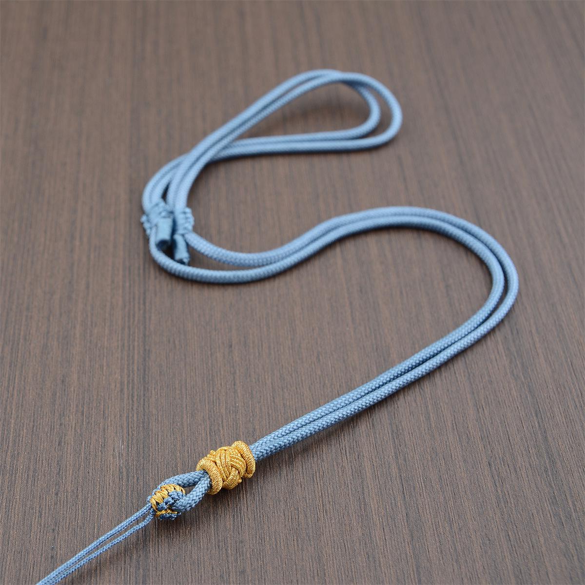 Gold  Jade Pendant Necklace with Hand-Woven Cord – Unisex