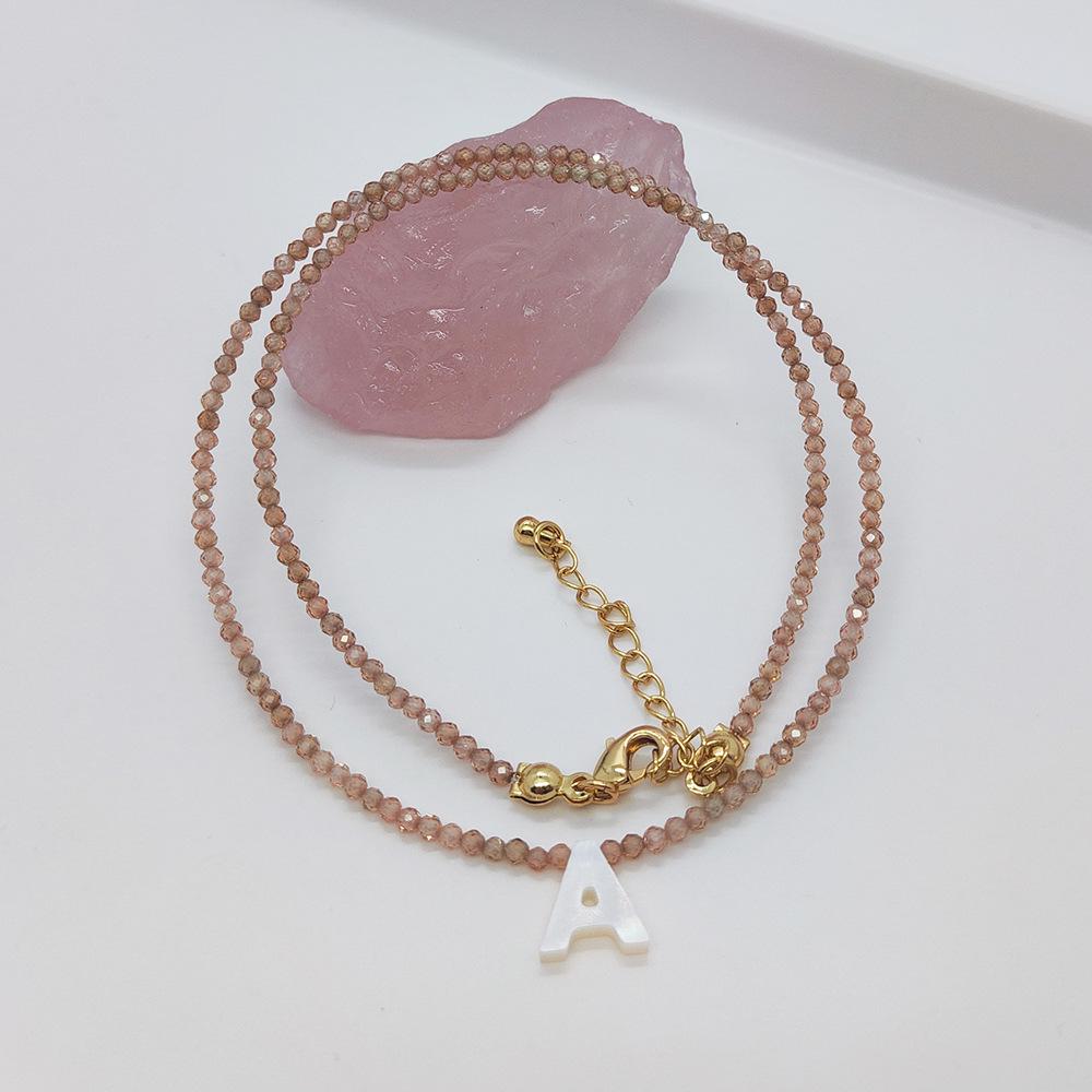 Elegant 2m Zircon Beaded Clavicle Chain: 26-Letter Deep Sea Shell Necklace for Women.