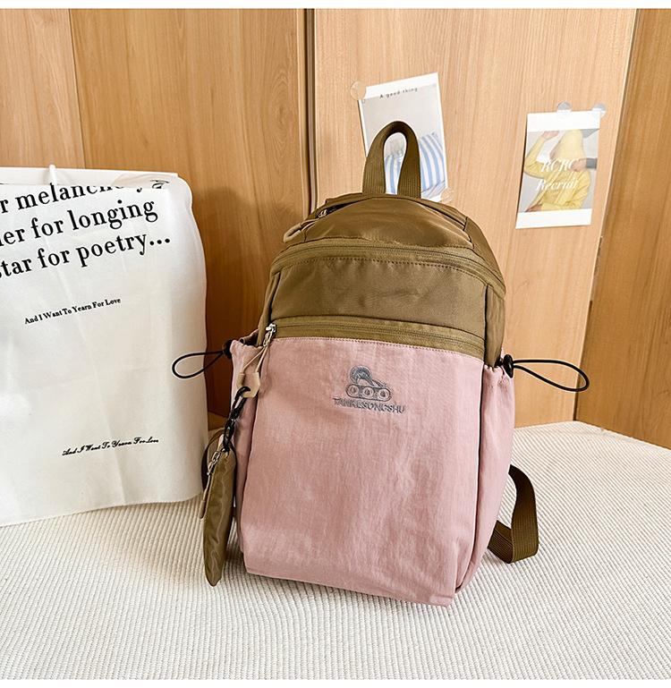 

Школьный рюкзак Рюкзак для походов и альпинизма на открытом воздухе Универсальный повседневный и легкий рюкзак Сверхлегкая простая дорожная сумка Легкая сумка для отдыха розовый