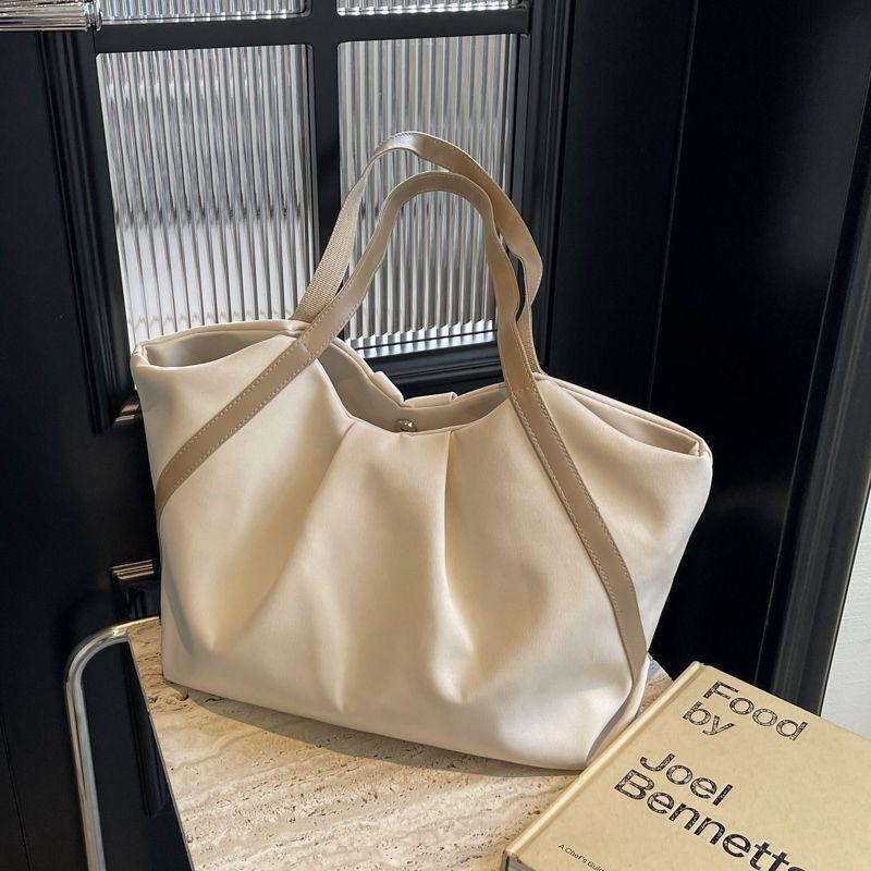 Einfache und leichte Cloud-Tragetasche Koreanischer Stil Canvas-Tasche Nische Große Kapazität Pendler Umhängetasche