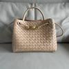Borsa a tote intrecciata in pelle con fibbia in corda metallica, design di nicchia, portatile a spalla, borsa a cesto per verdura di grande capacità