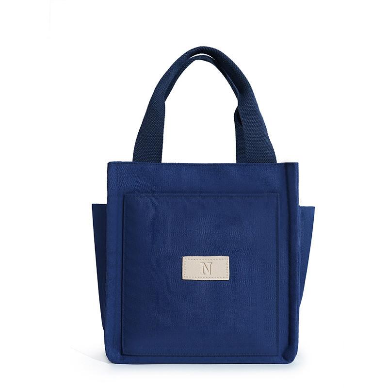 

Stylish Korean Style Canvas Tote Bag For Women With Convenient Pockets And Lunchbox Storage In Elegant Colors темно-синього кольору