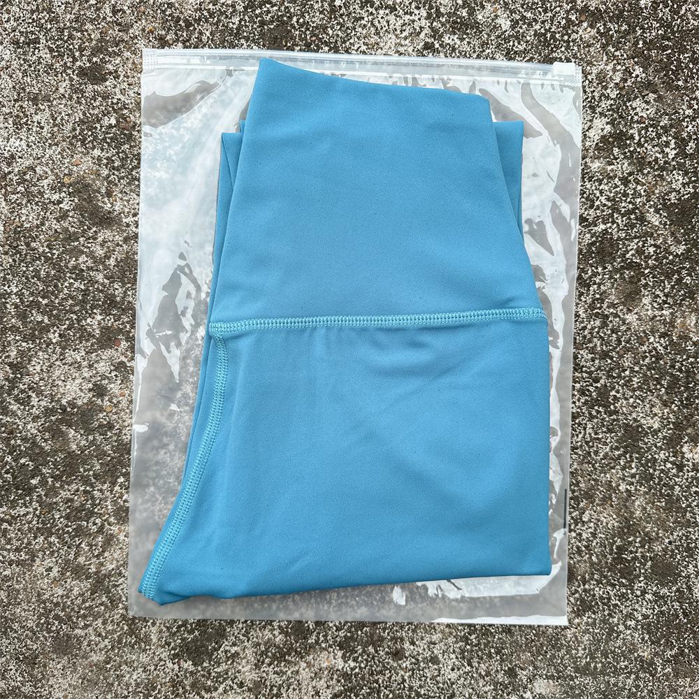 Solid Color High-Waisted Women's Yoga Leggings with Back Pocket – Soft, Elastic, and Peach Bum Enhancing