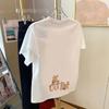 Apricot shoulder cartoon print short-sleeved t-shirt women's summer white cotton loose top