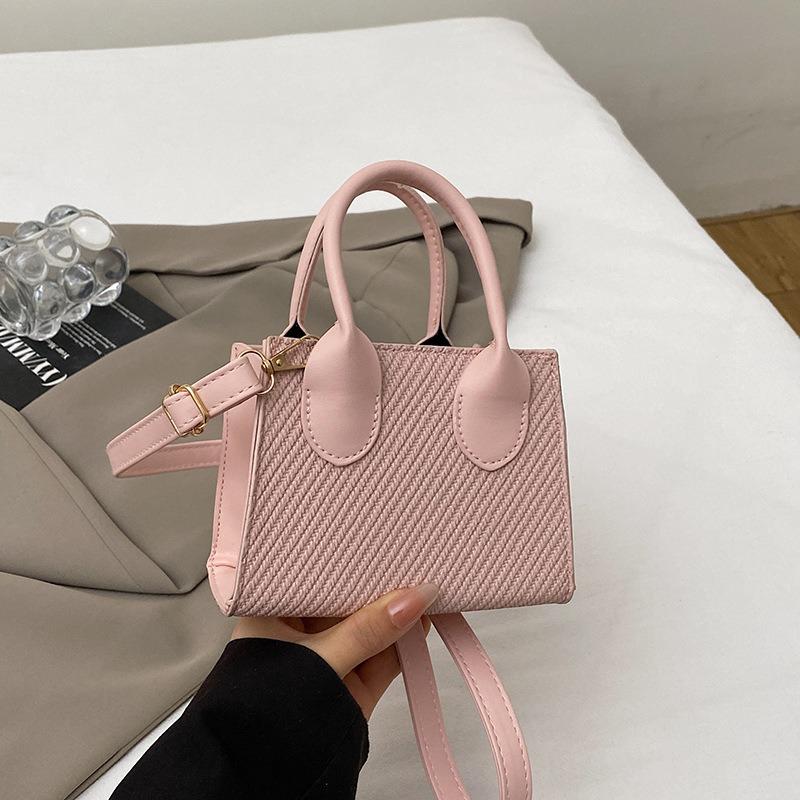 Sommer neue Tasche Damenmode einfache Umhängetasche tragbare kleine quadratische Tasche Damentasche lässige Pendler Umhängetasche
