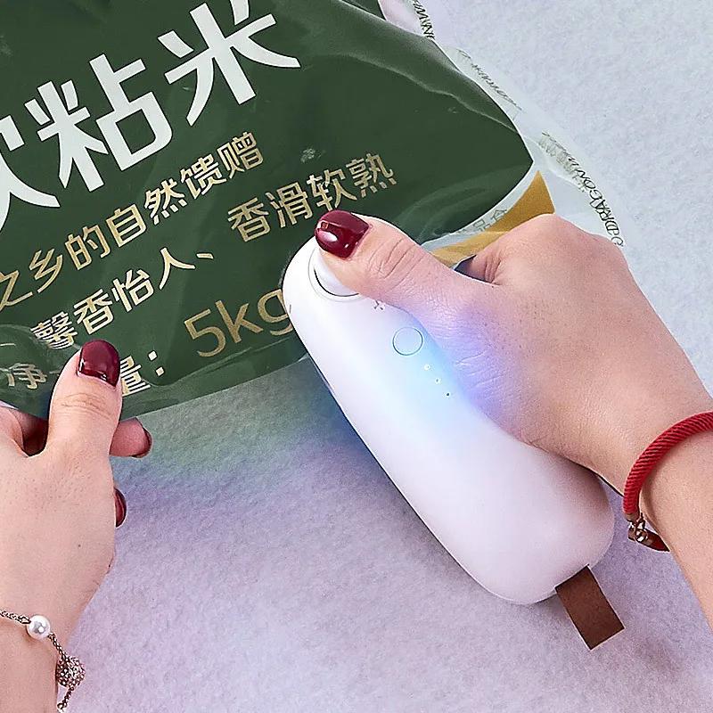 USB Charging Sealing Machine Hand Pressure Portable Mini Heating Plastic Packaging Machine Handheld Vacuum Food Sealing Device