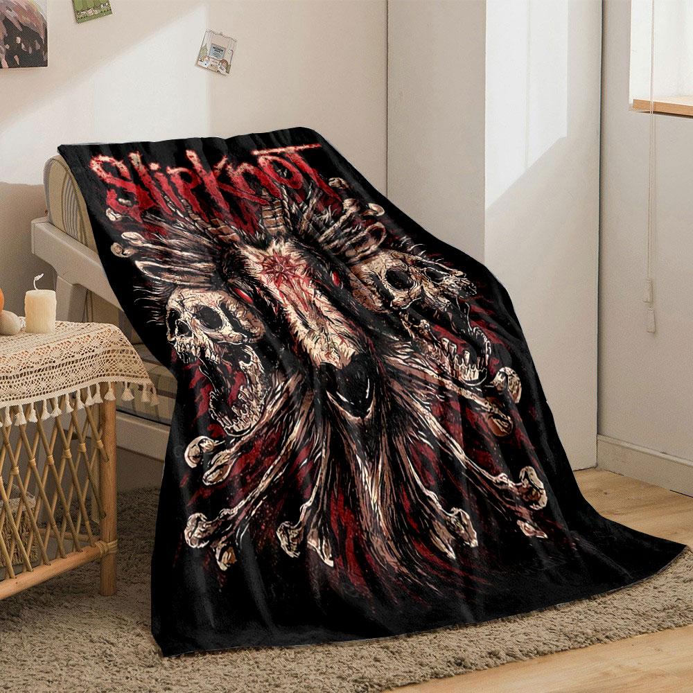 A goat skull with horns, surrounded by detailed skulls and fiery textures. for all seasons blanket lunch break throw gift