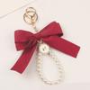 Elegant Pearl Chain Keychain with Large Ribbon Bowknot Pendant Stylish Keychain for Women and Girls Bag Decoration