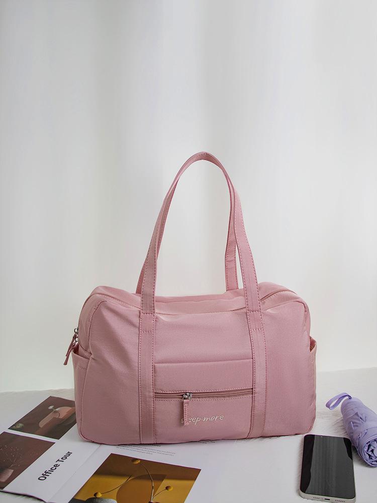 

Нишевая нейлоновая парусиновая сумка большой вместимости, легкая, женская, новая 2025 года, дорожная, для фитнеса, на плечо, портативная, сумка-тоут розовый