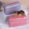 New Knitted Leather Makeup Bag Lightweight Handheld Bag Makeup And Skincare Product Bag Fashionable Phantom Storage Bag