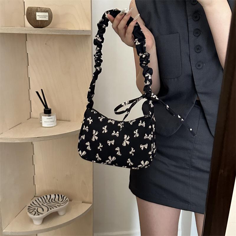 Popularna w tym roku modna torebka na ramię w stylu zagranicznym z kwiatowym wzorem, letnia, casualowa, z nylonu