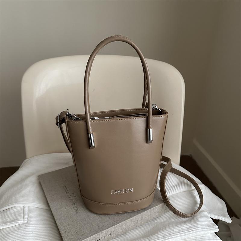 

2025 fashion hand-carried bucket bag women s summer new simple casual shoulder bag French high-end trendy women s bag хаки