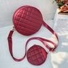 Bag women's new solid color rhombus embroidered messenger small round bag with change small bag fashionable one