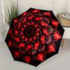 This Compact Umbrella Showcases a Lively Red Mandala Pattern with Petal Motifs Extending Outward from The Middle. Ideal for Tr