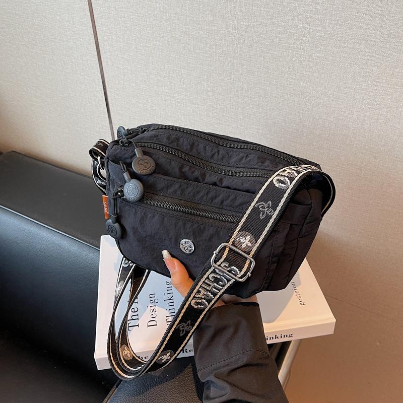 

Women s bag Classic versatile close-fitting small square bag Oxford cloth shoulder messenger bag Multi-pocket travel bag чорний