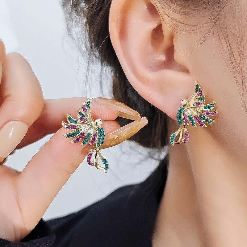 

Huitan Colorful Phoenix Bird Stud Earrings for Women Cocktail Party Personality Female Accessories Fancy Gift Statement Zircon