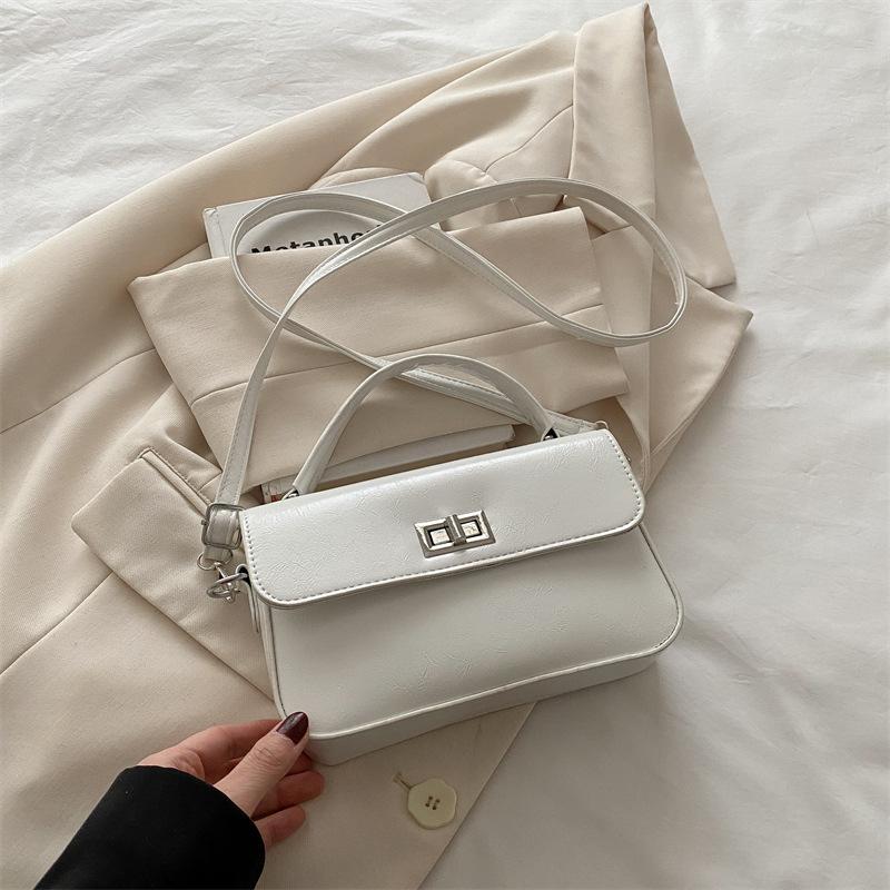 This year's popular small bag women's 2025 new versatile black portable small square bag simple lock shoulder messenger bag