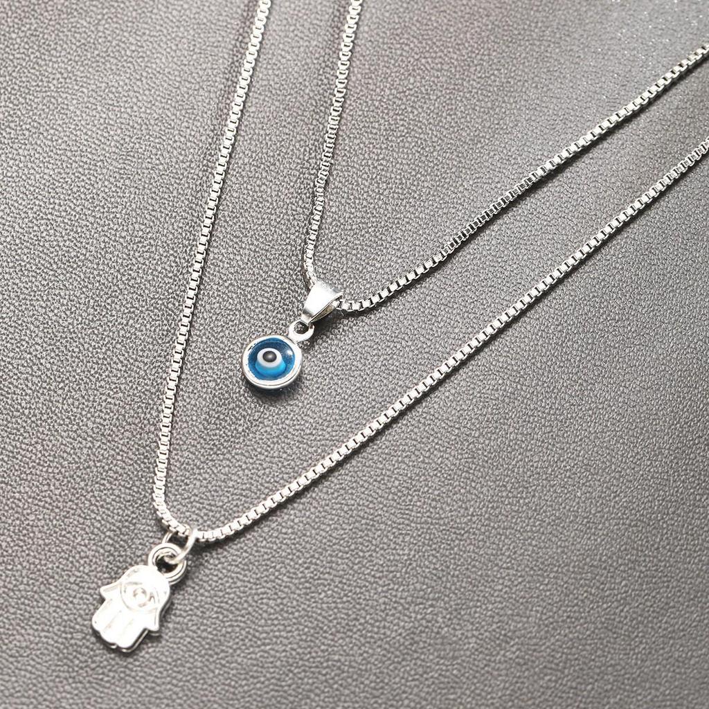 Collana Pendente Mano Occhio Turco Retrò - Doppio Strato, Versatile, Stile Europeo & Americano di Alta Gamma.
