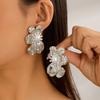 Exaggerated metal ginkgo biloba stud earrings, trendy girl sweet cool wind shell pattern earrings