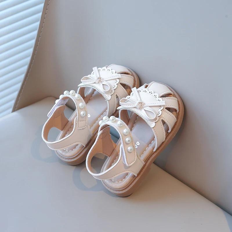 

Девочки Пляжная Обувь 2025 Лето Детские Сандалии С закрытым носком Защита от ударов С бантом Ажурные С жемчугом В бусинах Принцесса Милые Шикарные Мягкие 21 бежевый