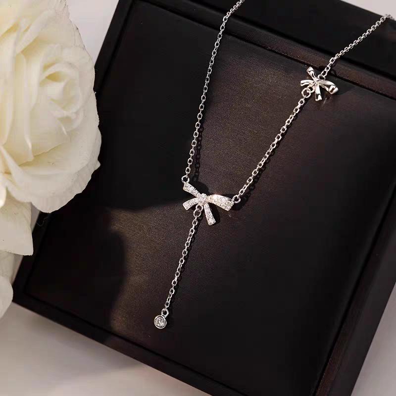 Elegant S925 Sterling Silver Bow Tassel Necklace: Luxury Clavicle Chain for Women with a Chic, Sophisticated Touch.