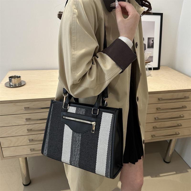Fashion stripes, new trend contrasting colors, large-capacity tote women, one shoulder hand carrying crossbody commuter big bag women