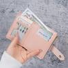 Compact Slim Wallet for Women Featuring Multiple Card Slots, a Zipper, And Button Closure