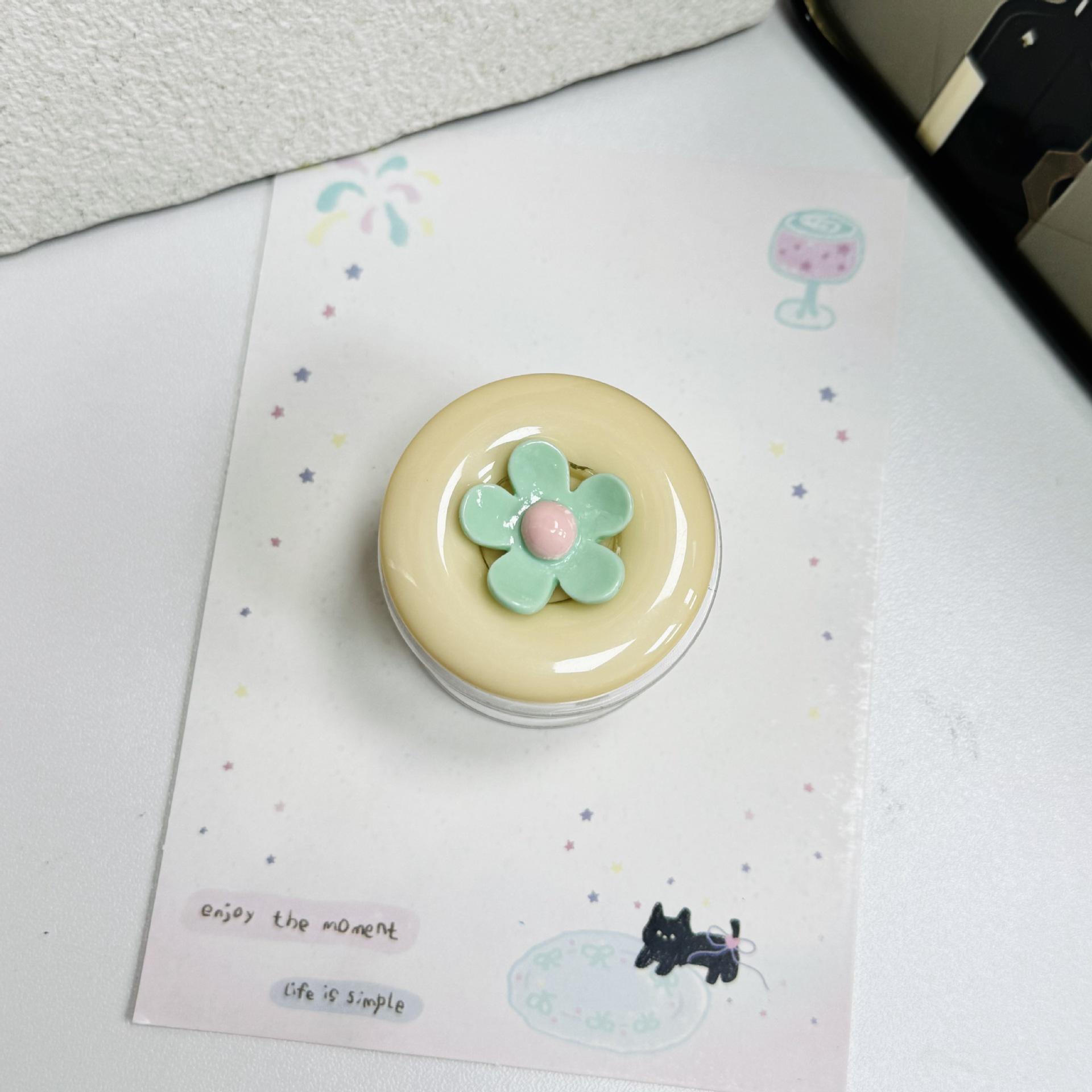 Colorful Contrast Button Flower Creative Rotating Airbag Stand for Desktop Universal