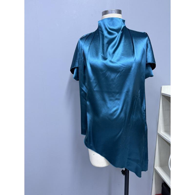 Haut à ourlet asymétrique tendance pour femme pour l'été