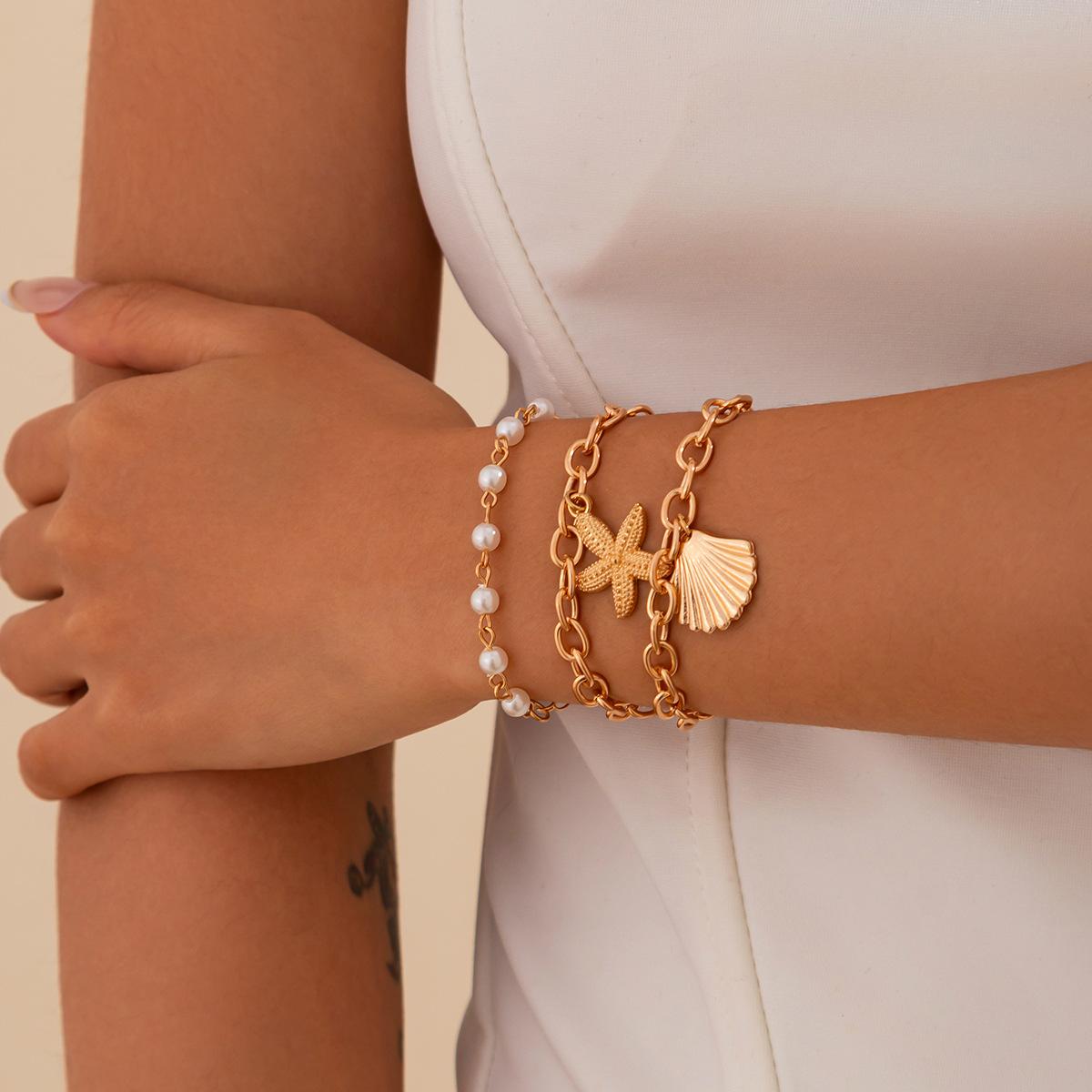 

Пляжный отдых Морская звезда Ракушка Сплав Подвеска Браслет Премиум Жемчуг Бижутерия для рук Свежая и милая Повседневная Бижутерия для женщин