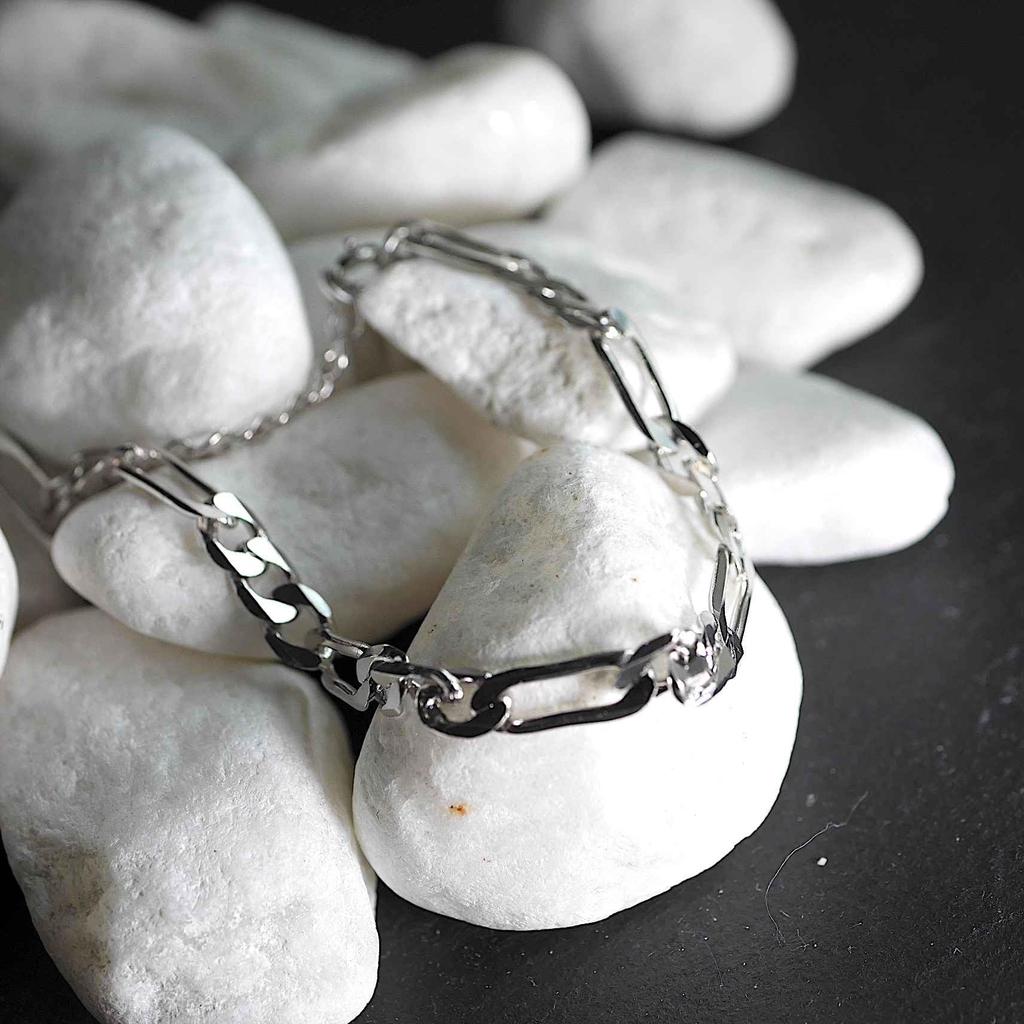 Figaro Curb Chain Bracelet in 925 or 18K This and slender bracelet features a drawstring closure and is perfect for and cute This designer jewelry