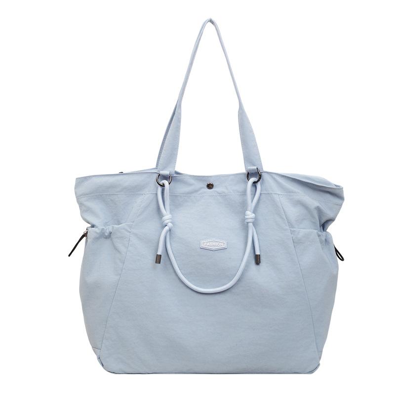 Japanese solid color nylon shoulder bag new large-capacity casual tote bag versatile foreign style student make-up bag