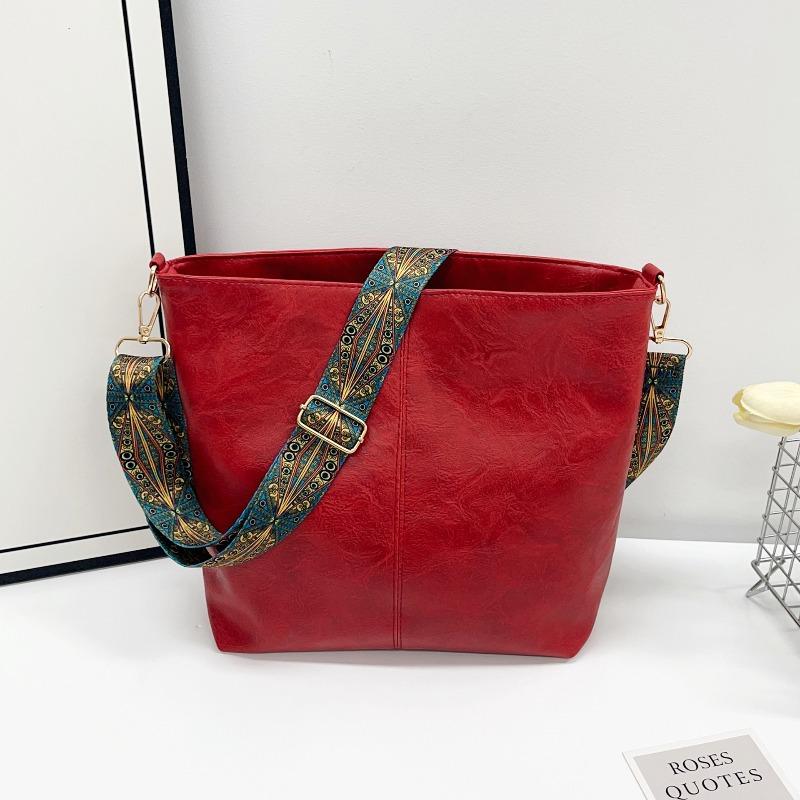 Large-capacity Bag Women's Spring and Summer New Retro Broadband Shoulder Messenger Bag Premium Texture Commuter Bucket Bag