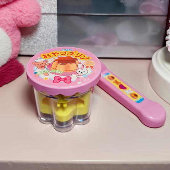 Simuliertes Pudding-Fütterspielzeug mit einziehbarem Löffel Rollenspiel Plüschtier Baby-Puppe Fütterungs-Interaktionsspielzeug Osterkorb-Füller