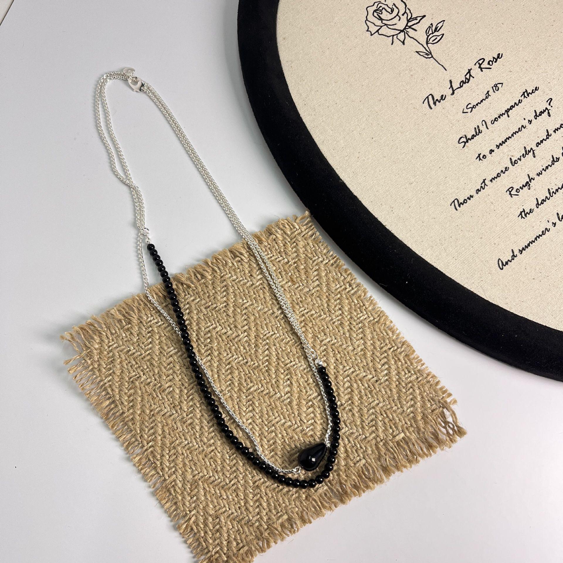 

2025 осень и зима новая длинная цепочка свитер цепь сращивание серебряное ожерелье обсидиан женская нишевая цепочка на шею премиум ключичная цепочка