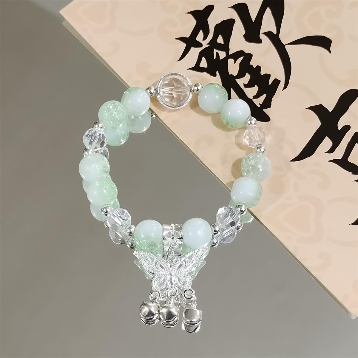 

Милые браслеты для девочек на руку с бабочкой, сердечком, колокольчиком, замком-кисточкой, бисером с трещинами на льду, стеклянными бусинами, эластичным браслетом для студентов 1PCS зелёный