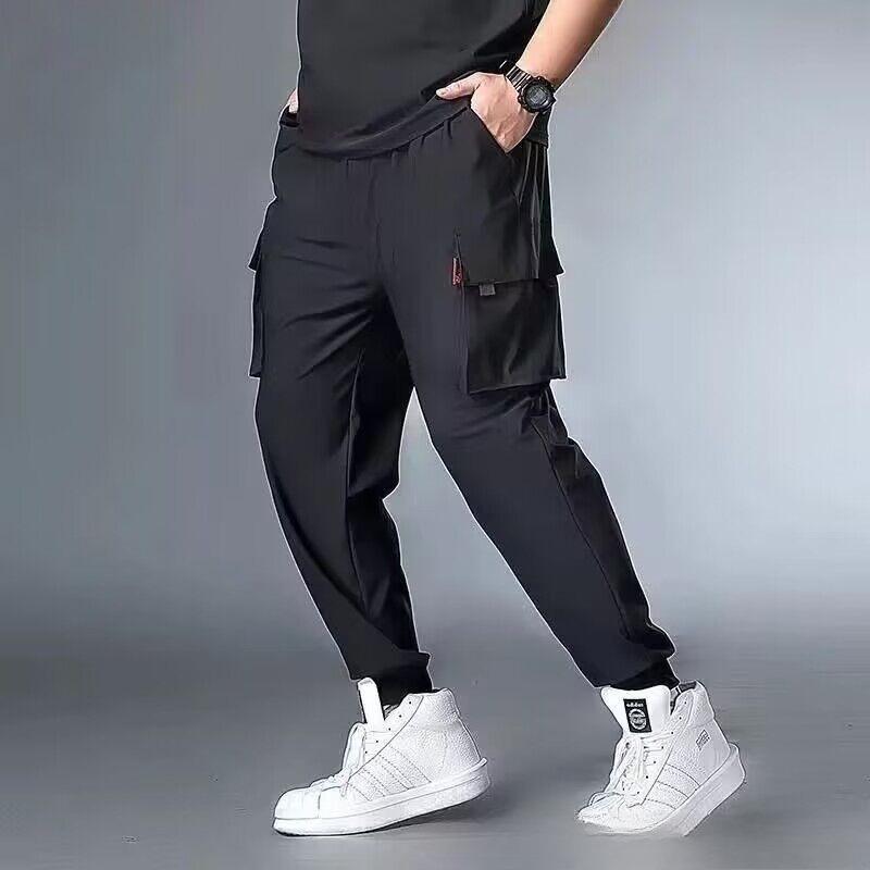 

Большого размера черные повседневные брюки летние брюки из ледяного шелка мужские легкие свободного кроя большие карманы манжеты на штанинах спортивные длинные брюки 10XL