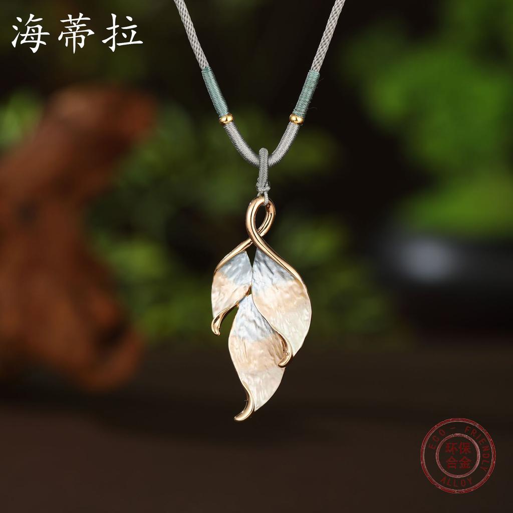 Neue Emaillefarbe unregelmäßiges Blatt gewebtes Seil langer Anhänger Damen Retro High-End Blatt lange Halskette