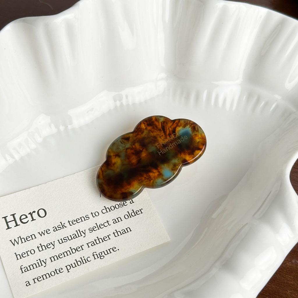 Fashionable And Stylish Acetate Cloud Hair Tie With Gold Accent And Elegant Hair Clip