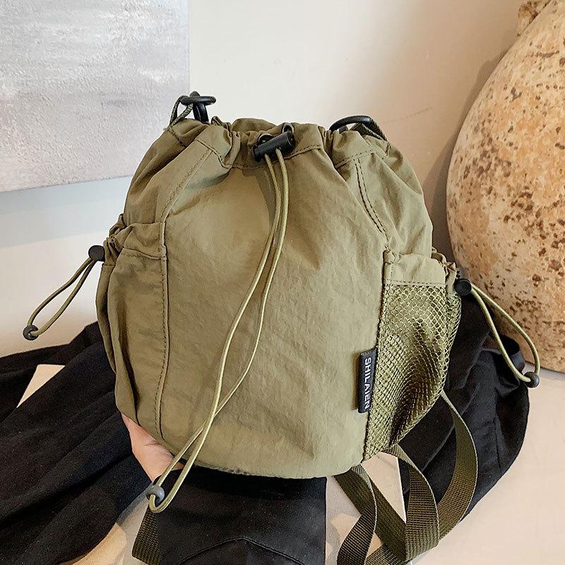 Trendy New Fashion Ins Casual Simple and Lightweight Drawstring Bucket Bag Commuting Versatile Sports Travel Messenger Bag