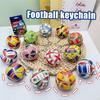 Mini Runder Knopf Fußball Schlüsselanhänger Mehrere Flaggen Dekompression Elastisches Stressabbau Spielzeug Tragbar Sportfan Souvenir Angst Geschenk