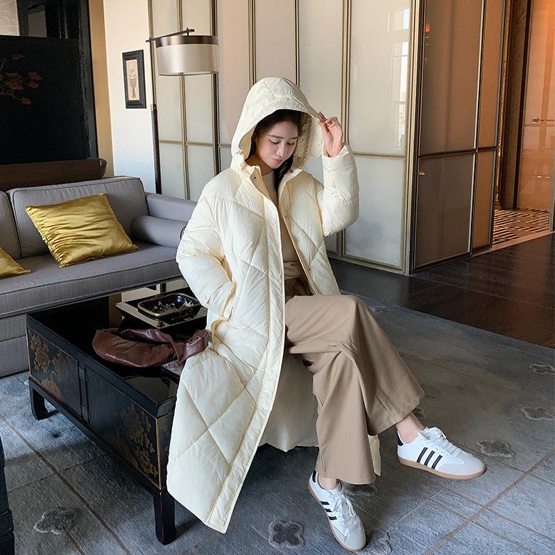 

2025 New Cotton-padded Women s Winter Medium and Long Korean Version Loose Design Cotton-padded Jacket Over the Knee Thickened Jacket Tide 2XL бежевый