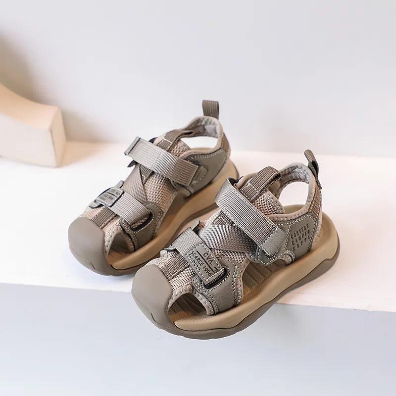

Girls sandals summer 2025 new children s sports bag head girls beach shoes boys shoes summer middle and older children 30 inner length 19.2CM армия зеленый