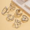 Fashionable stainless steel ring with a simple hollow geometric design, suitable for stacking and versatile for casual wear