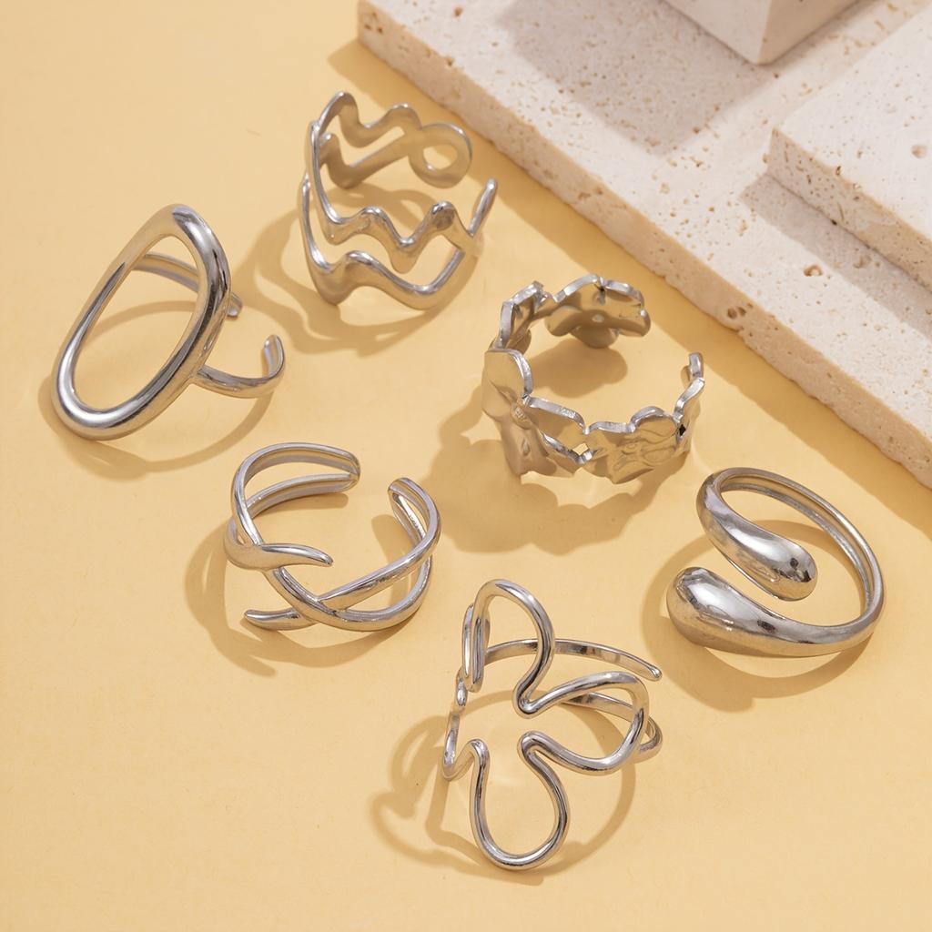 Fashionable stainless steel ring with a simple hollow geometric design, suitable for stacking and versatile for casual wear