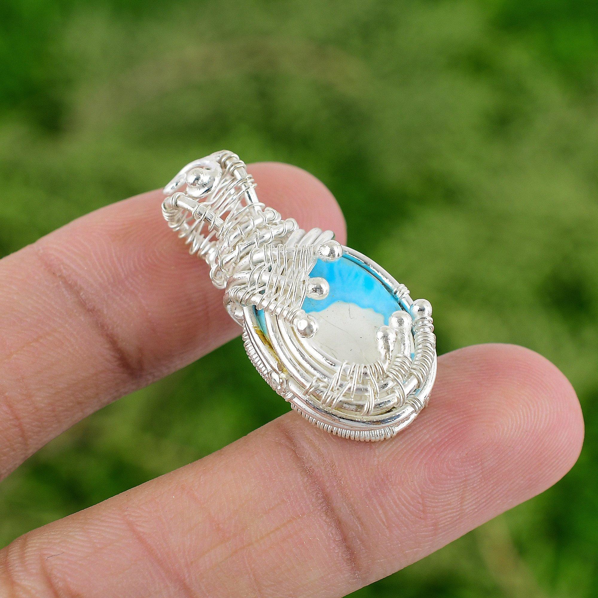 

Natural Sleeping Beauty Turquoise Sterling Silver Artisan Wife Wire Wrap Pendant