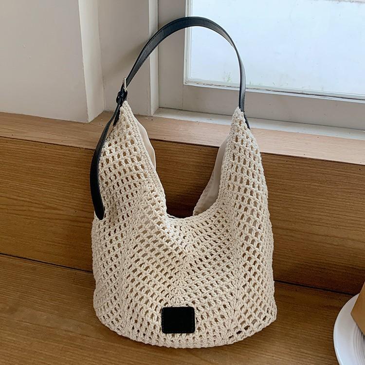 Woven hollow bag women's new seaside vacation style travel tote bag beach bag shoulder armpit bag tide
