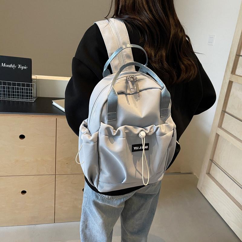 Schoolbag Multifunctional Small Backpack Men's and Women's 1011 New Neutral Wind Large Capacity Breast Bag Commuter Fashion Crossbody Backpack